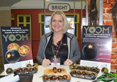 Leona Neill with Red Sun Farms proudly shows the new Yoom tomato to show attendees.